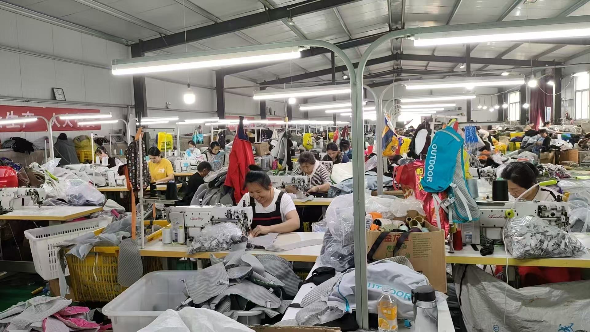 KalunStyles factory production floor with workers on sewing lines